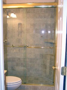 Custom tile shower and sliding glass doors